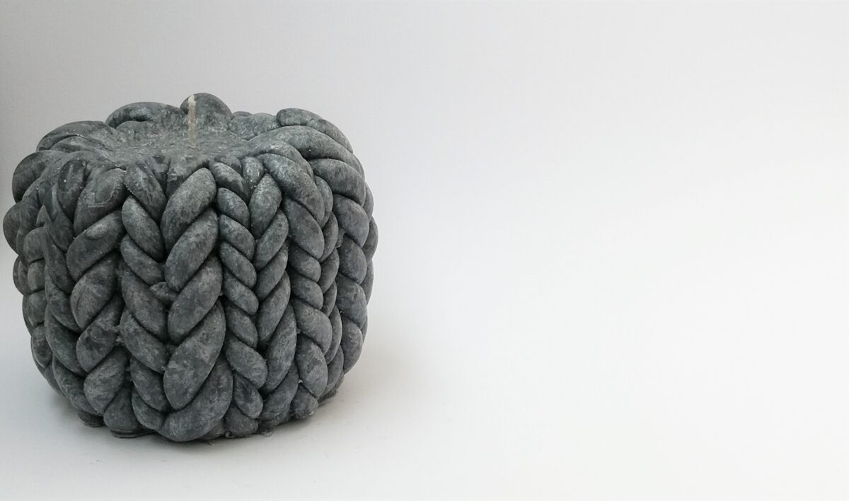 Knitted candle "Coziness"/ gray